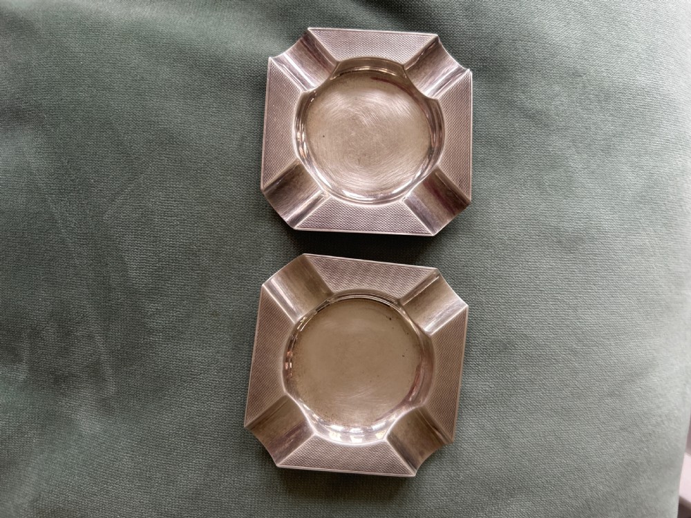 Two Silver ashtrays 