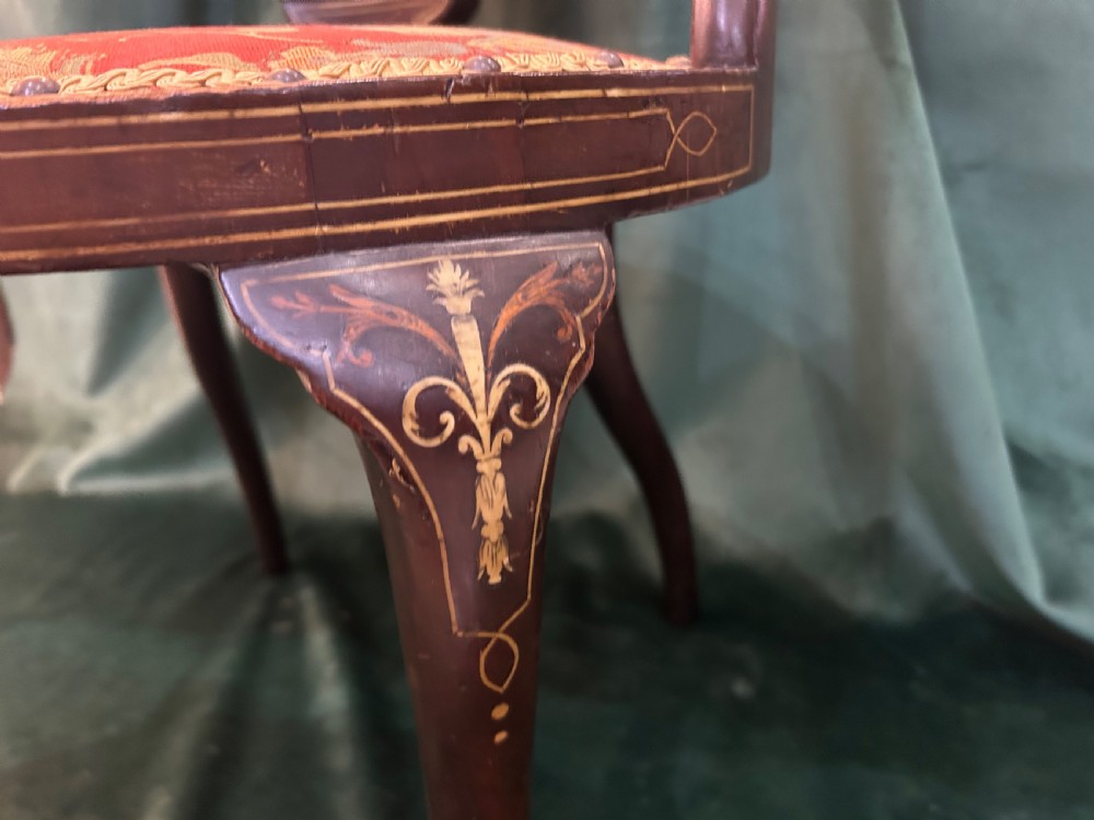 A nineteenth-century dark mahogany tub chair featuring intricate floral marquetry on the back splat and cabriole legs, fitted with a red floral upholstered seat. View III