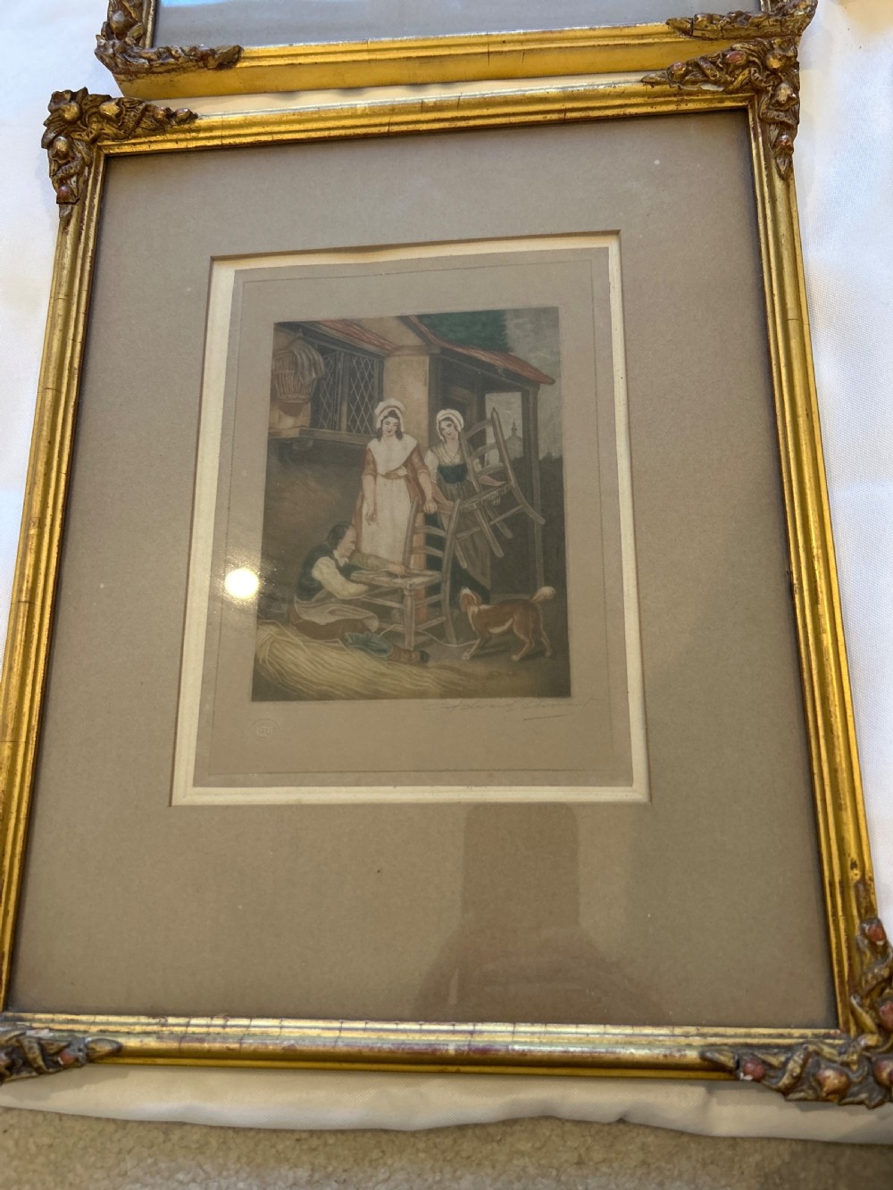 A set of seven framed antique mezzotint prints depicting classical figurative scenes, housed in ornamental gold leaf gilt frames with wide matting. View III