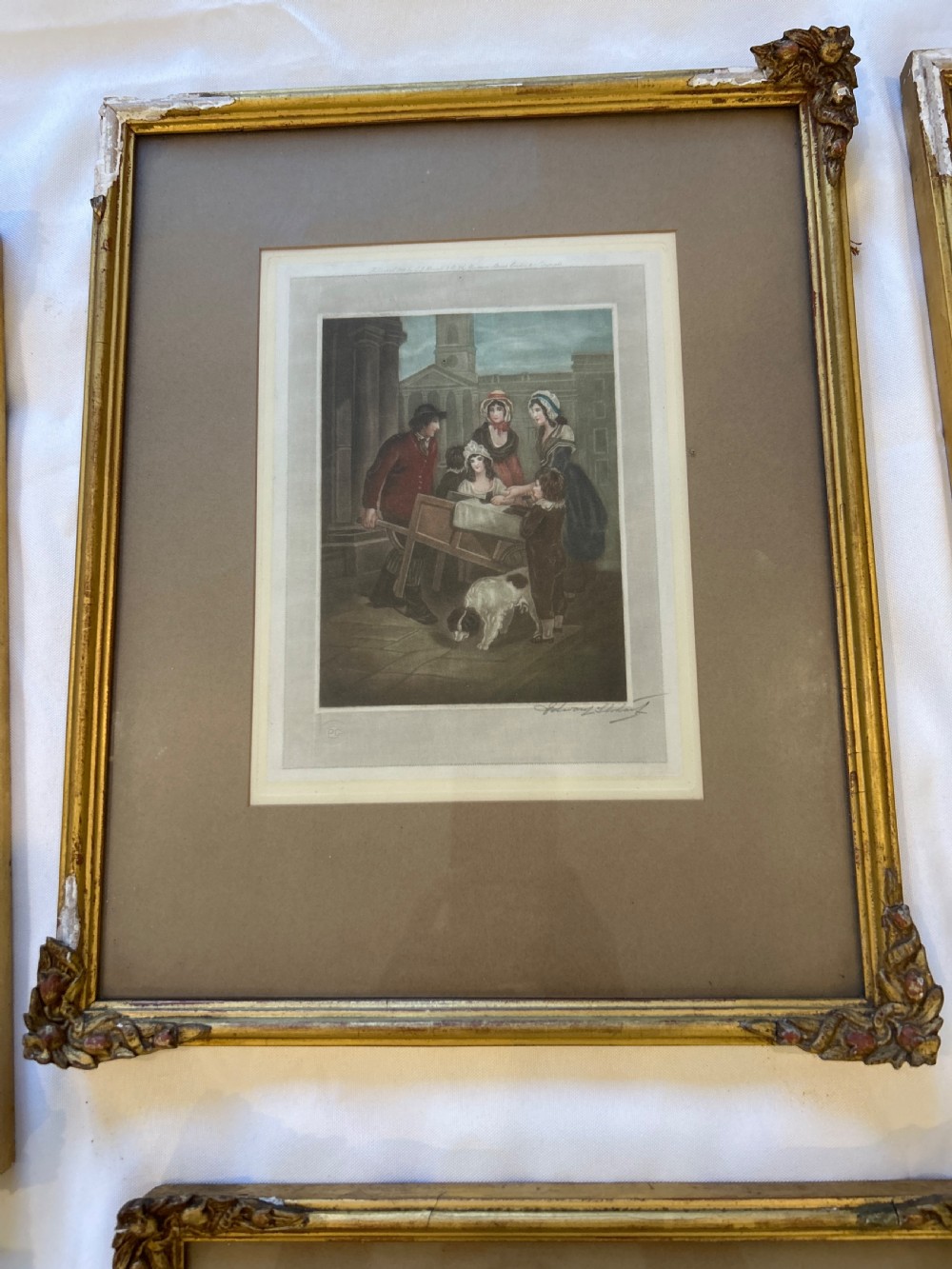 A set of seven framed antique mezzotint prints depicting classical figurative scenes, housed in ornamental gold leaf gilt frames with wide matting. View IV