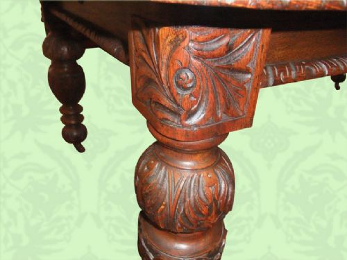 fig 2. Victorian carved oak extending dining table