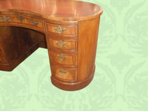 fig 1. Edwardian walnut kidney shaped desk