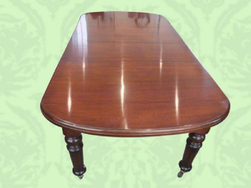 fig 3. Antique Victorian mahogany extending dining table