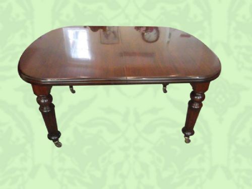 fig 5. Antique Victorian mahogany extending dining table