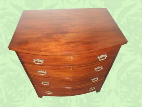 fig 1. Edwardian mahogany small bow-front chest