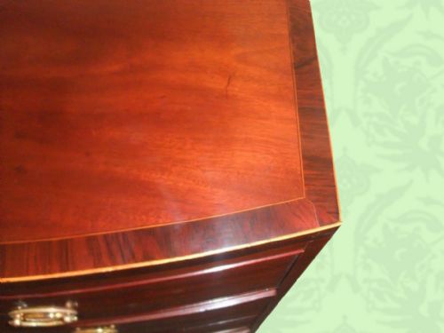 fig 2. Antique Georgian mahogany cross-banded chest of drawers