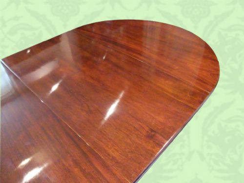 fig 1. Edwardian inlaid mahogany extending dining table