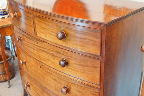fig 3. Antique mahogany bow front chest
