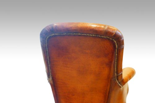 fig 4. William IV mahogany button-back leather easy chair