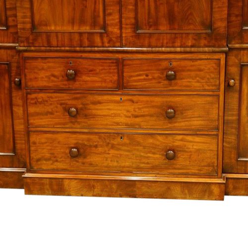 fig 1. William Iv mahogany break-front wardrobe with press