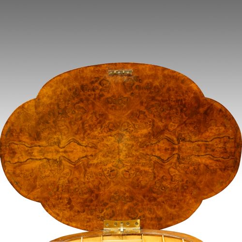 fig 1. Victorian inlaid walnut shaped oval work-table
