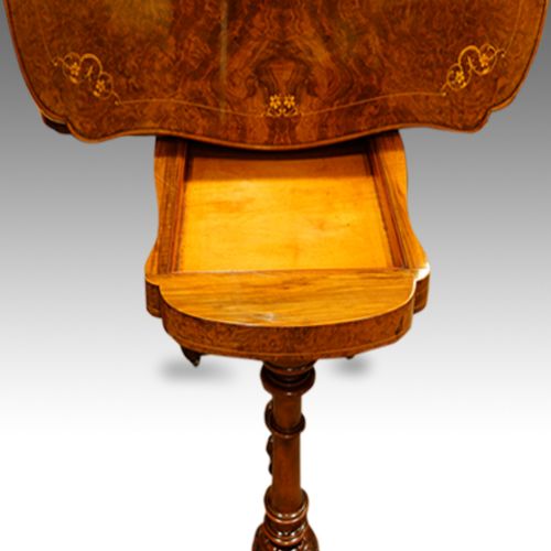fig 1. Victorian shaped walnut inlaid card-table