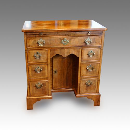 fig 1. Edwardian walnut knee-hole chest