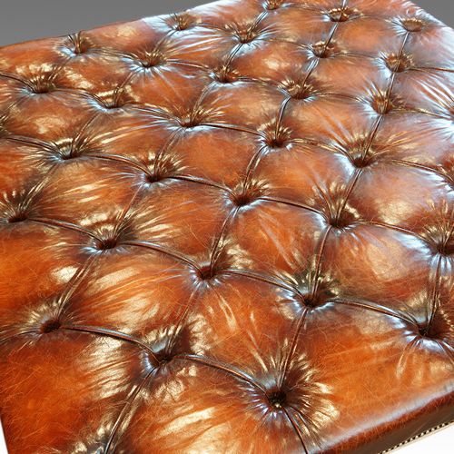 fig 1. Magnificent leather and walnut coffee table stool