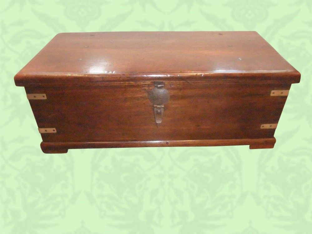 Antique Colonial teak trunk with brass corners