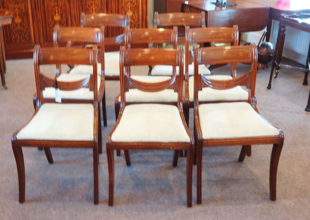 Set of 8 Regency mahogany sabre leg chairs