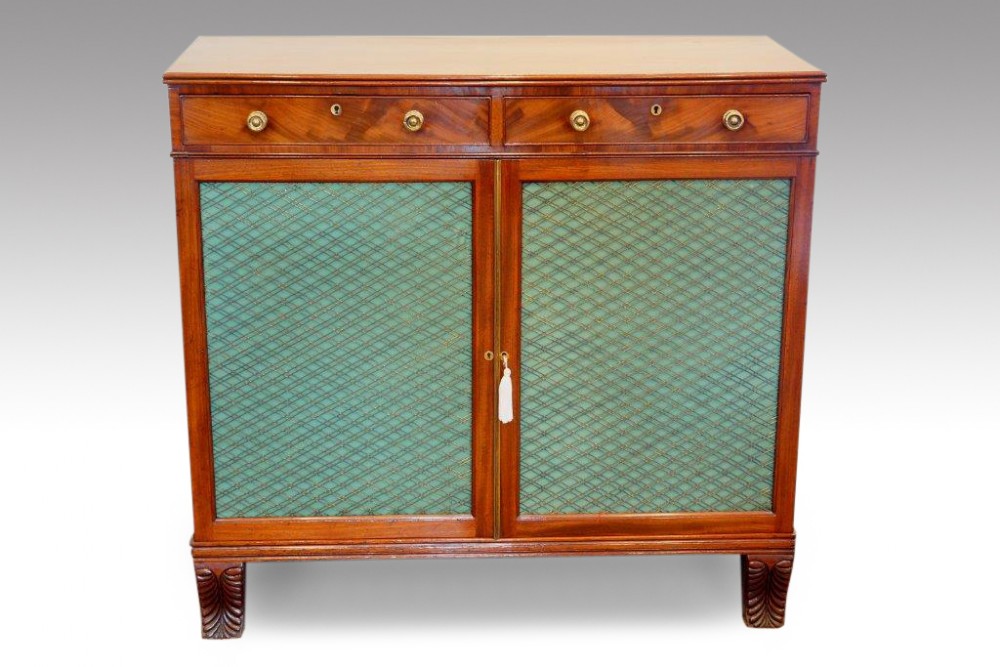 Regency mahogany side-cabinet with brass grilled doors
