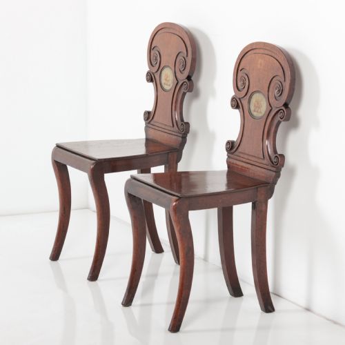 A PAIR OF 19TH CENTURY ENGLISH HALL CHAIRS