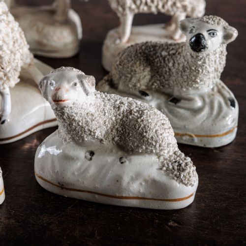 A COLLECTION OF EIGHT 19TH CENTURY STAFFORDSHIRE SHEEP - ADDITIONAL PHOTO 1