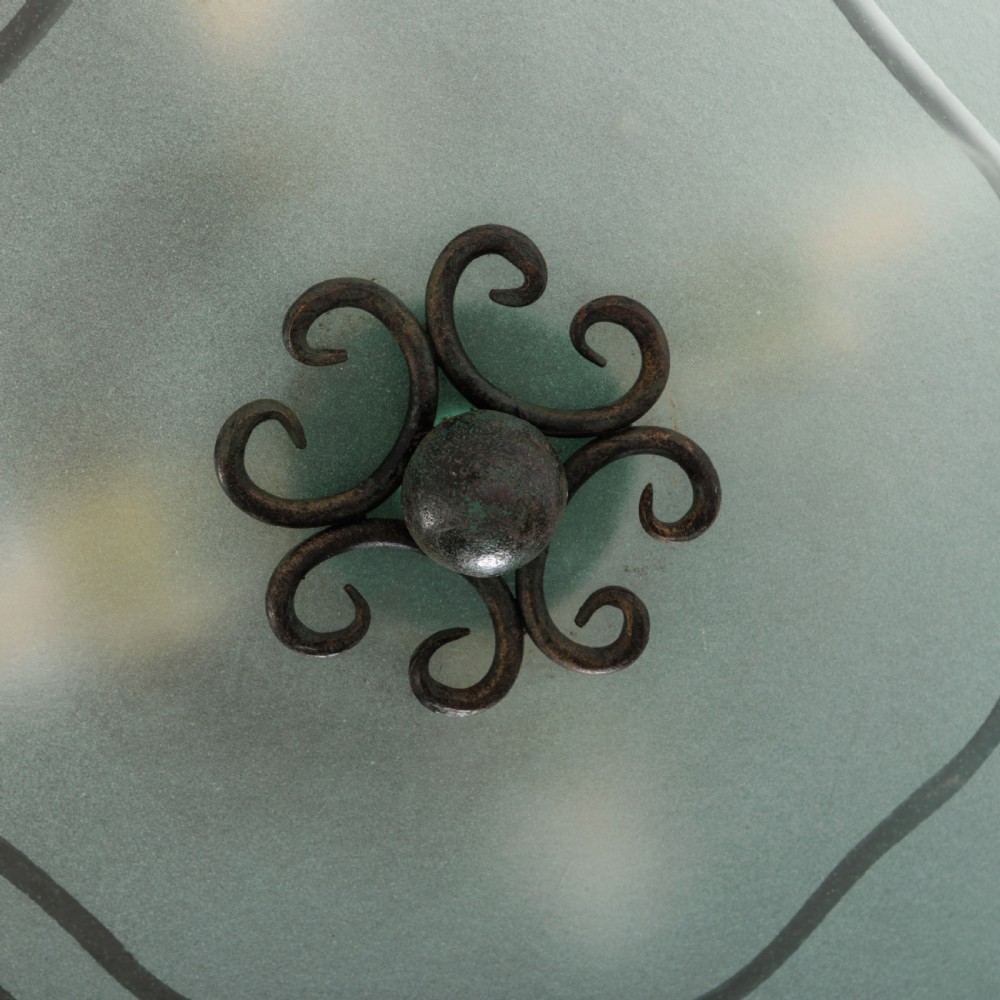 A shallow pale green frosted glass dish ceiling light featuring etched flying crane motifs and patinated metal central fittings. View V