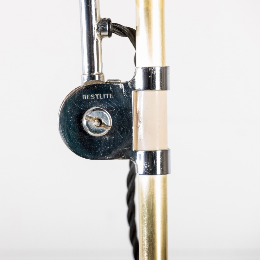 A 1930s Bestlite desk lamp featuring a cream enamelled shade and base, a curved chrome gooseneck arm, and an adjustable brass stem. View II