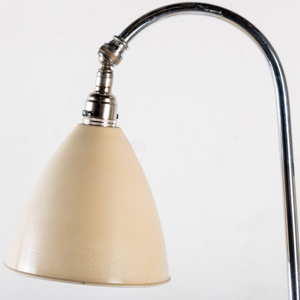 A 1930s Bestlite desk lamp featuring a cream enamelled shade and base, a curved chrome gooseneck arm, and an adjustable brass stem. View IV