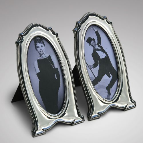 A Pair of Art Nouveau Silver Photograph Frames