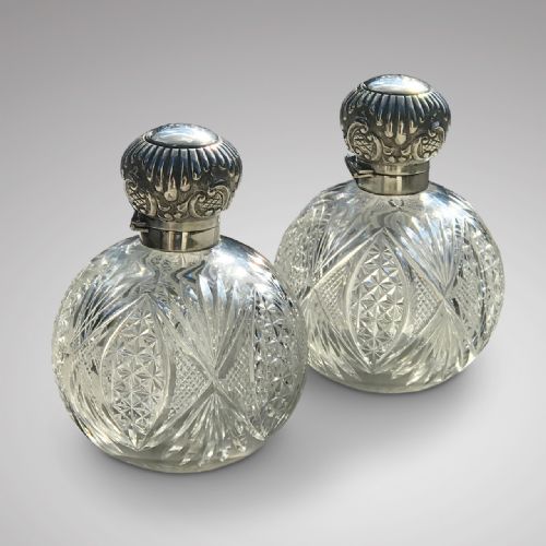 A Pair of Silver Topped Scent Bottles