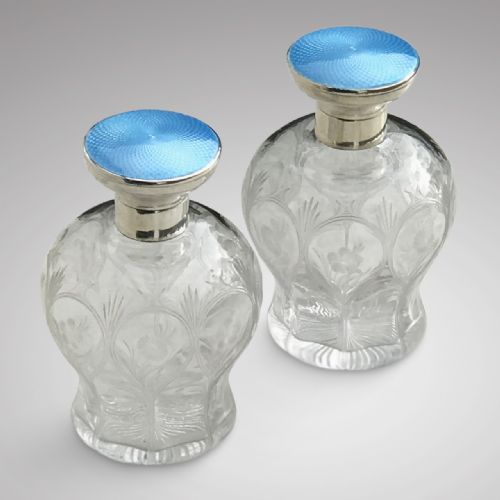 Pair of Large Early 20th Century Silver and Enamel Topped Scent Bottles