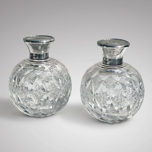Pair of Cut Glass Perfume Bottles with Silver Hinged Lids
