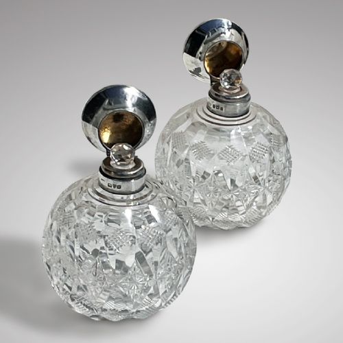 fig 1. Pair of Cut Glass Perfume Bottles with Silver Hinged Lids
