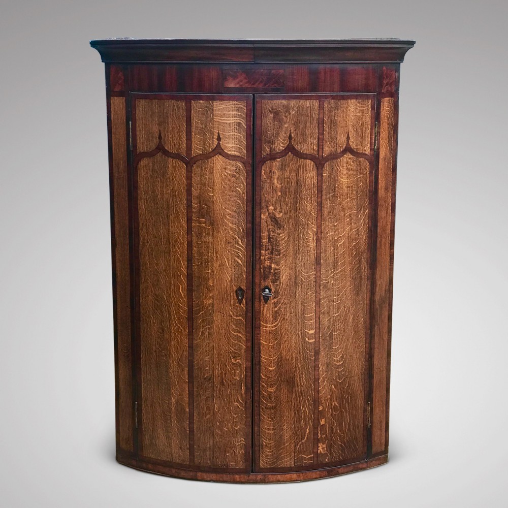 George III Bow Fronted Oak Corner Cupboard
