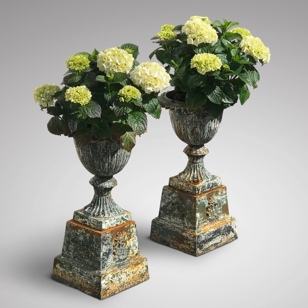 Pair of Victorian Cast Iron Urns on Plinths