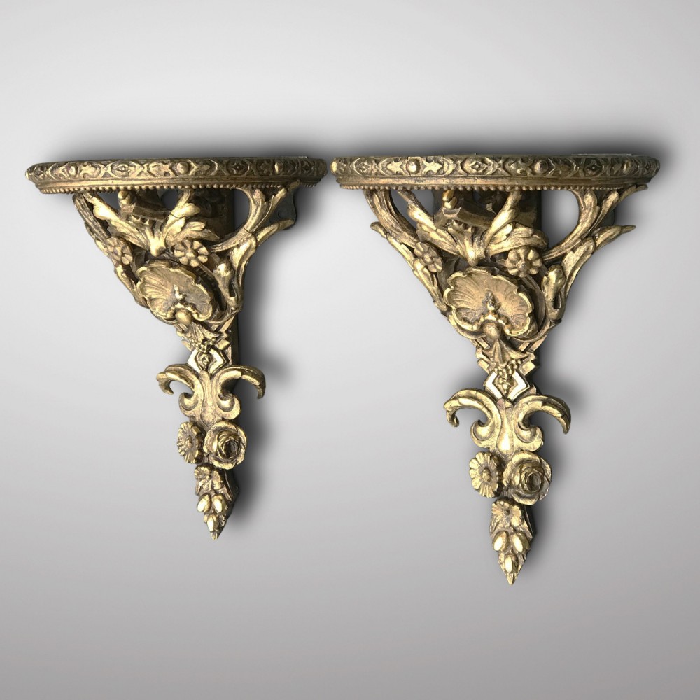 PAIR OF  19TH CENTURY GILTWOOD AND GESSO WALL BRACKETS