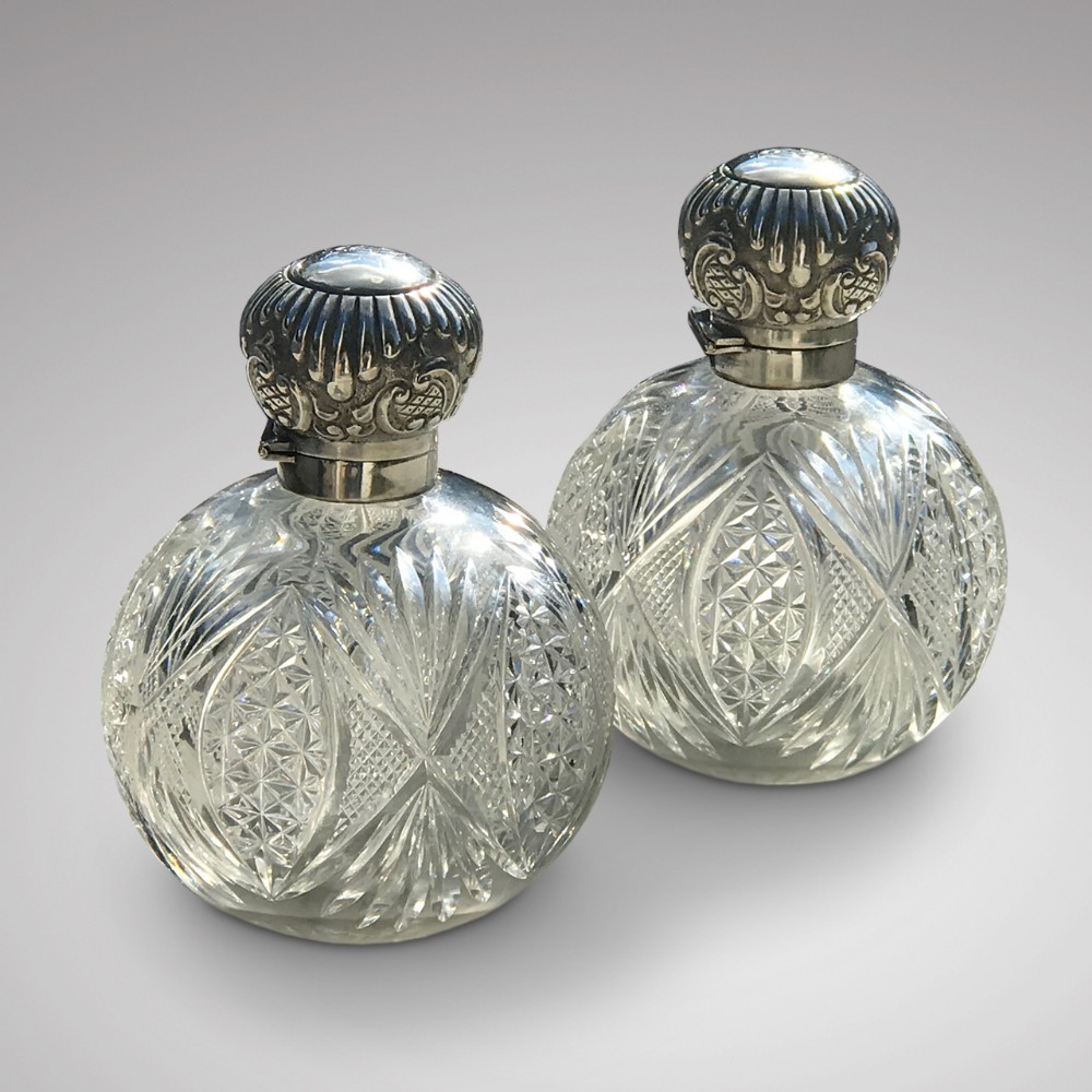 A Pair of Silver Topped Scent Bottles
