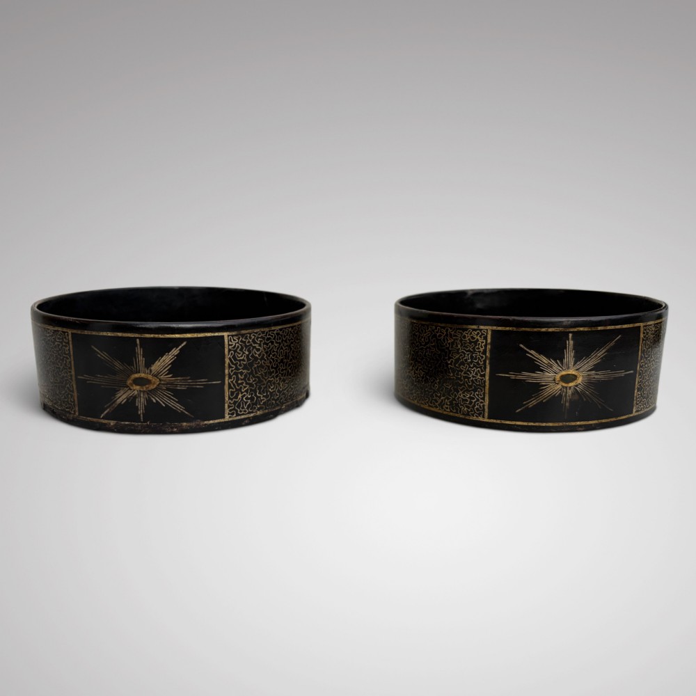 A Pair of Regency Papier Mache Wine Coasters