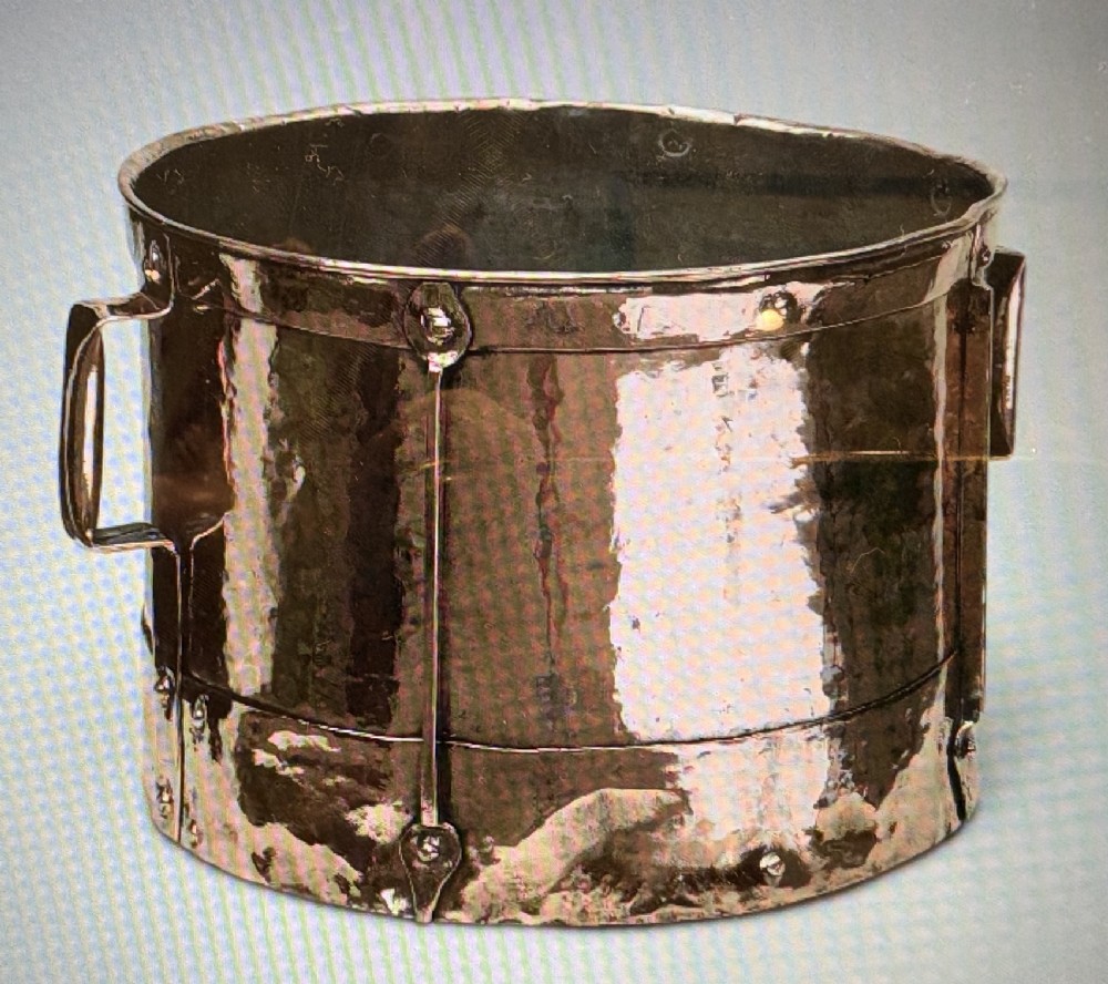 A cylindrical antique French copper grain measure featuring side handles, vertical metal banding, and hand-riveted construction. View II