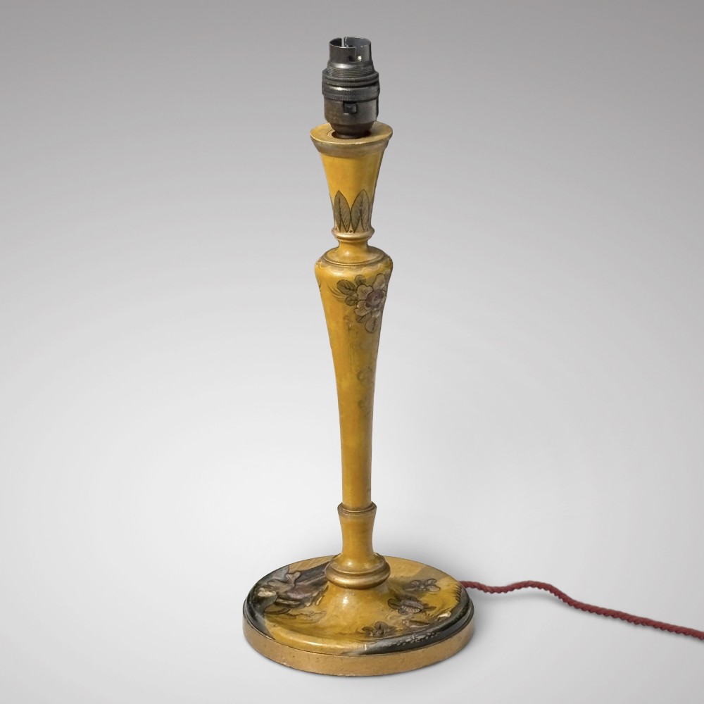An antique ochre yellow lacquered table lamp featuring hand-painted Chinoiserie motifs and a cream scalloped lampshade. View II