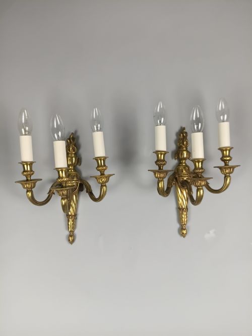 PAIR OF FRENCH TRIPLE ARM GILDED BRASS WALL LIGHTS