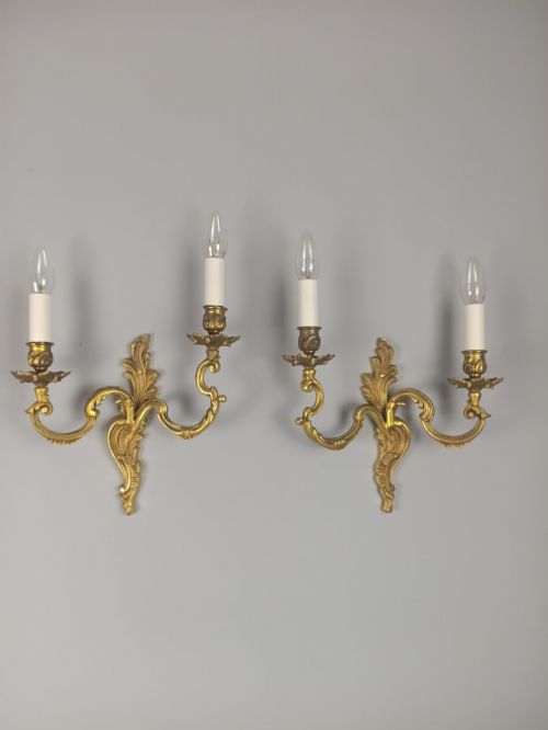 PAIR OF FRENCH ANTIQUE TWIN ARM ROCOCO GILDED BRONZE WALL LIGHTS
