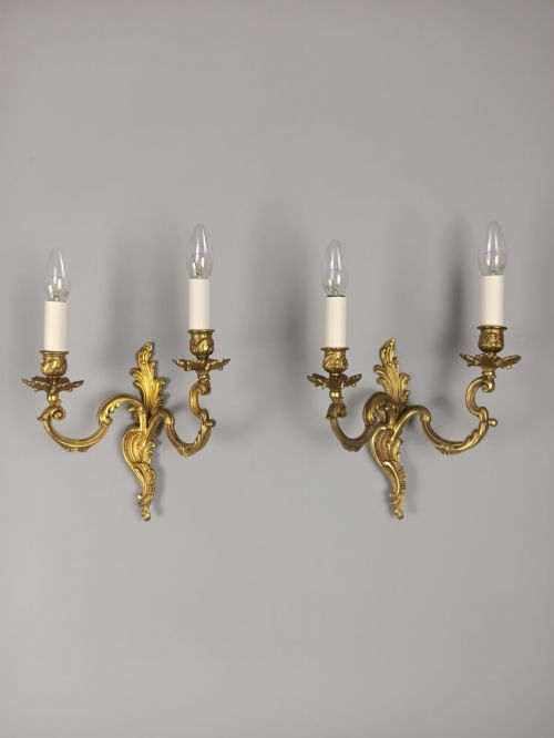 PAIR OF FRENCH ANTIQUE TWIN ARM ROCOCO GILDED BRONZE WALL LIGHTS