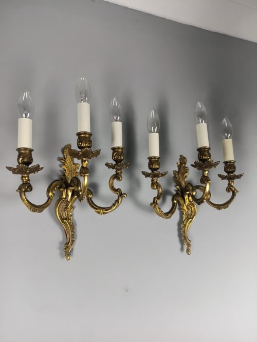 Pair of French Antique Triple Arm Rococo Gilded Bronze Wall Lights
