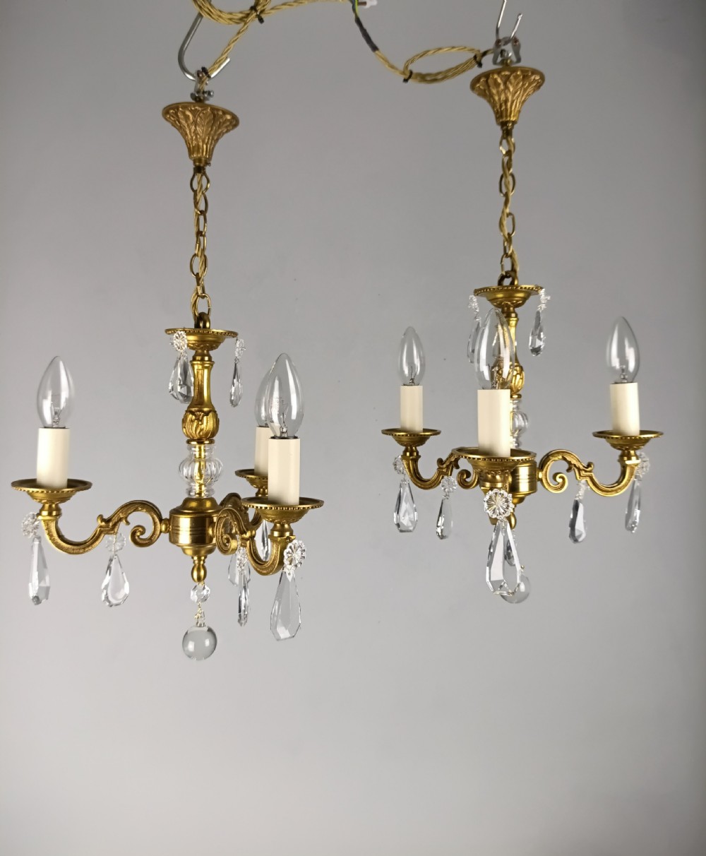 Pair of Triple Arm Crystal Gilt Brass French Chandeliers 
