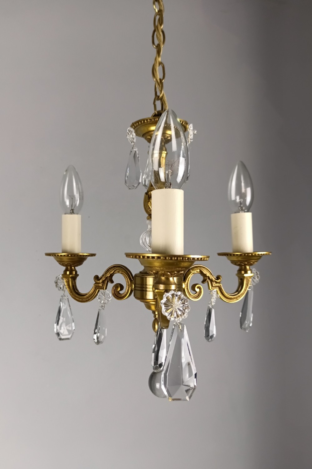 Pair of Triple Arm Crystal Gilt Brass French Chandeliers  View II