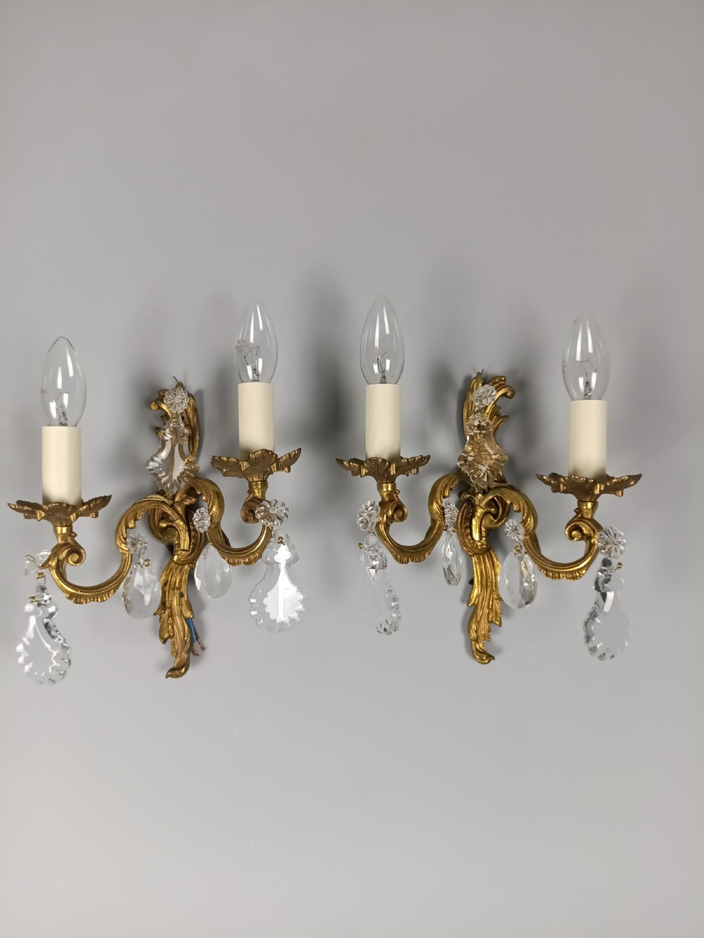 Pair of French Gilded Twin Arm Antique Wall Lights With Crystals