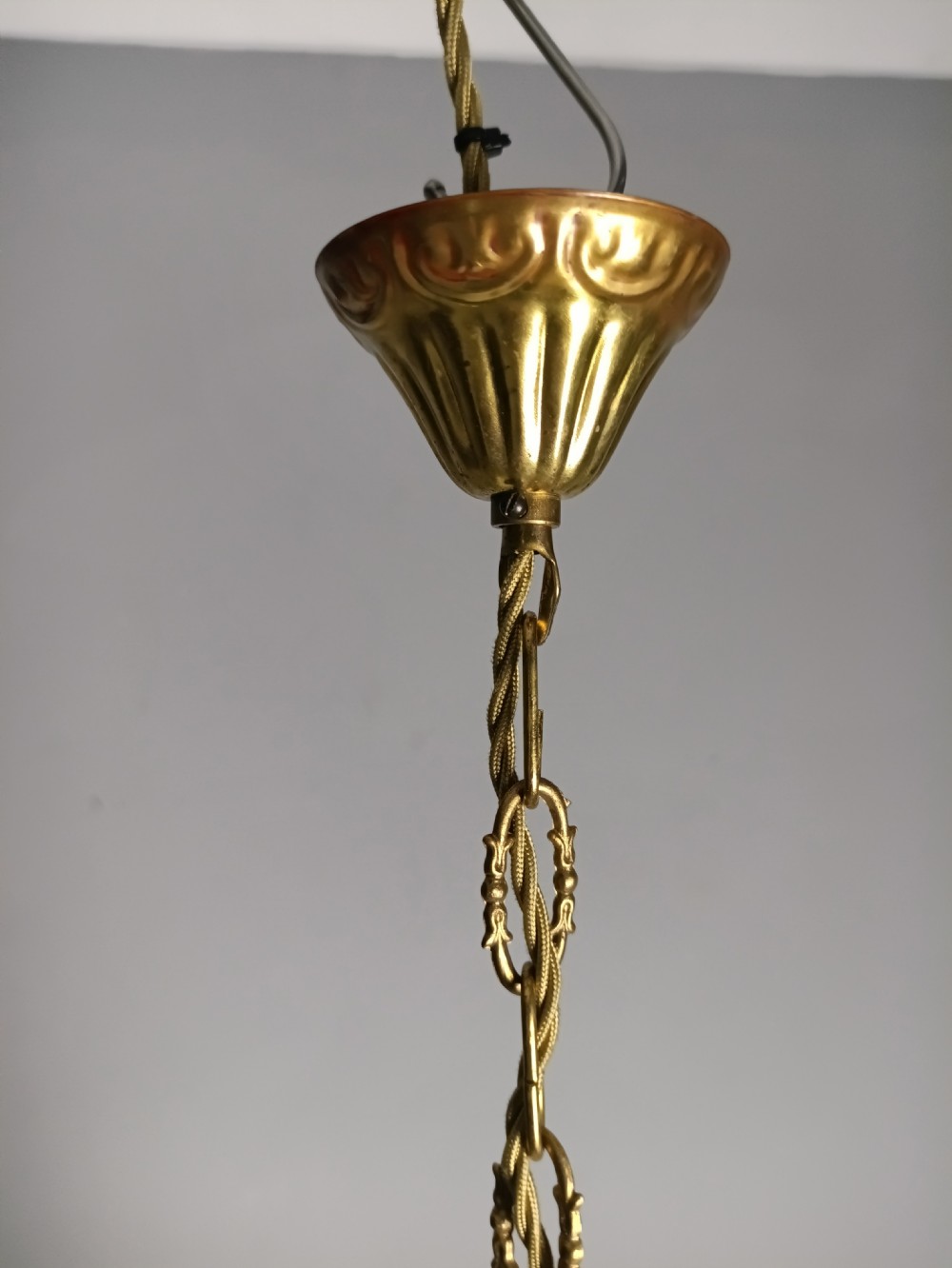 An antique French tent and bag chandelier featuring cascading crystal beads attached to a decorative brass rim with cut glass prisms below. View IX