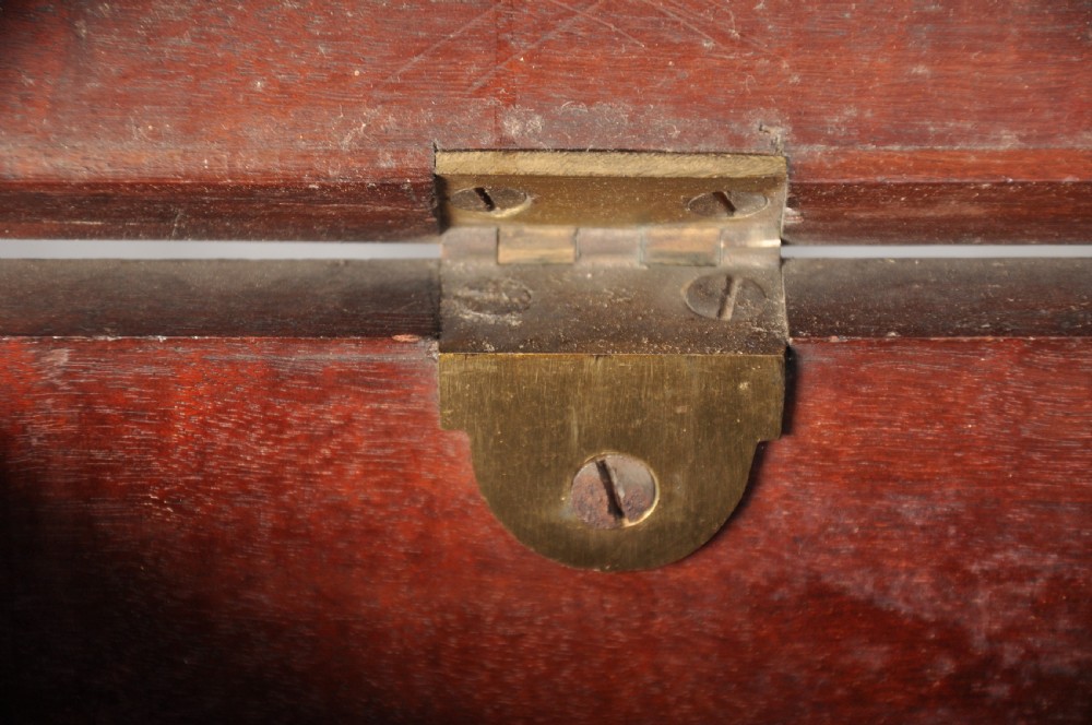 An 18th-century mahogany silver chest featuring a hinged lid, twin base drawers, side carrying handles, and bracket feet. View VII