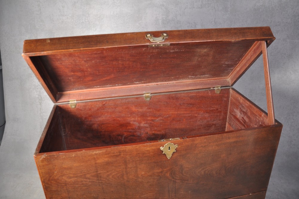 An 18th-century mahogany silver chest featuring a hinged lid, twin base drawers, side carrying handles, and bracket feet. View VIII