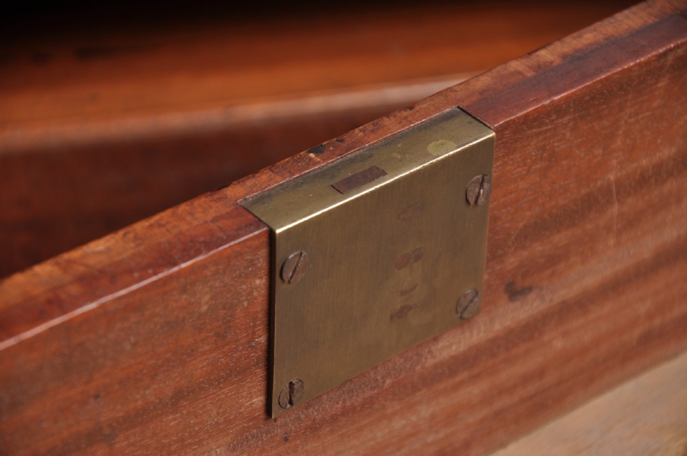 An 18th-century mahogany bureau bookcase featuring a blind two-door upper cabinet, a slant-front writing slope, four long drawers, and bracket feet. View XVII