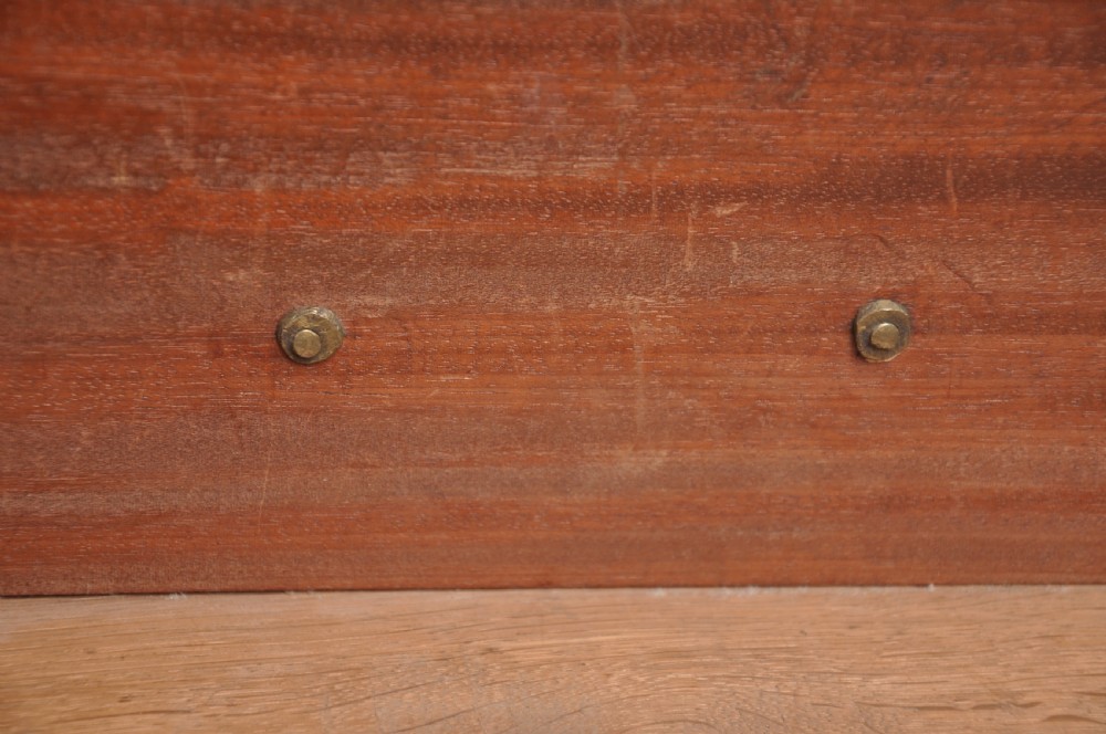 An 18th-century mahogany bureau bookcase featuring a blind two-door upper cabinet, a slant-front writing slope, four long drawers, and bracket feet. View XVIII
